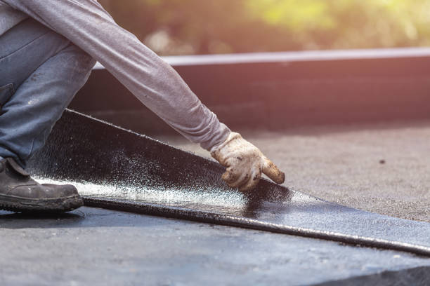 Professional Exterior Waterproofing technician working in Howell, NJ